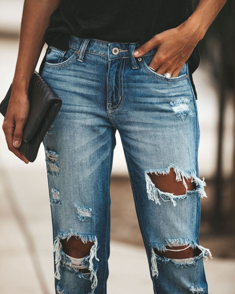 Women Fashion Mid Waist Ripped Jeans.